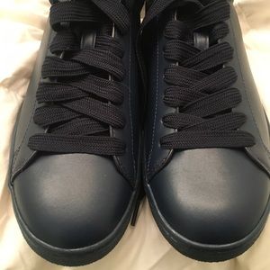 Coach low top lace-ups. Blue leather.